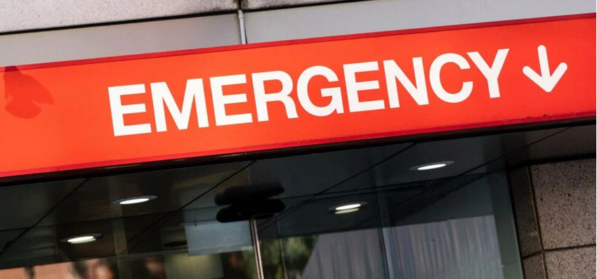 Emergency signage outside a hospital entrance
