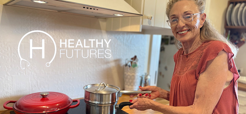 Woman cooking on electric stove as part of the Healthy Futures open letter campaign to stop gas home cooking